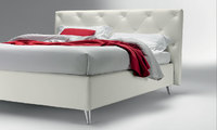 Guru Bed with modern quilted headboard and metal leg