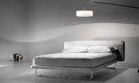 Modern Doxy Bed with metal legs and minimal design