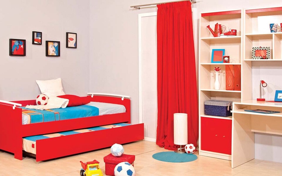 Composition of a child's bedroom with raised bed and second wheelchair, desk, library and PRIME hanging bins