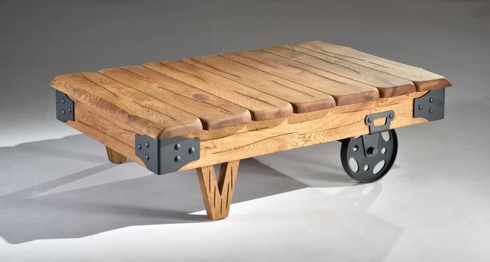 Modern living room table with metal wheels