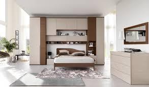 Wardrobe Overhead system combining bedding and open shelves