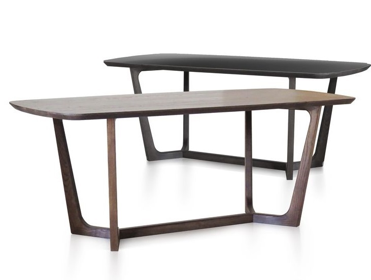 Modern table made of solid oak, walnut or beech wood with original design at Carino's feet