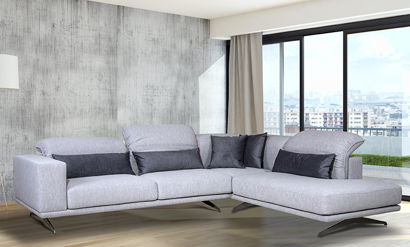 Corner sofa with retractable mechanism on the back pillows