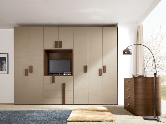 Vitality 9 wardrobe with shelf for TV and drawers